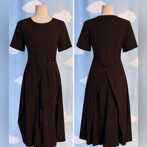 Asymmetric dress with buckles and drape-8